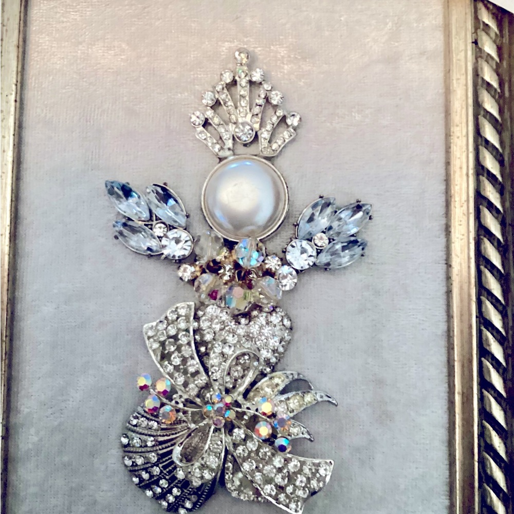 A jeweled angel named Lucinda, she will add elegance to any room you place her